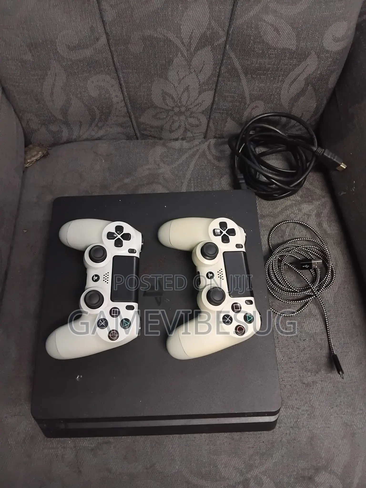 Playstation 4 Slim ( With Two Brand New Controllers and Games )