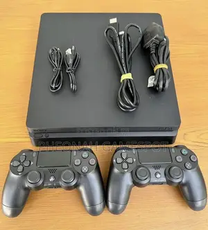 Ps4 Slim Very Clean With 2 Controllers and 15 Games Included