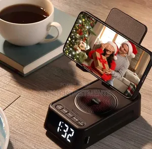 Phone Stand With Wireless Speaker and Alarm Clock.