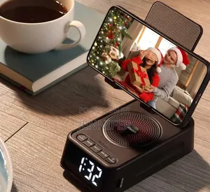 Phone Stand With Wireless Speaker and Alarm Clock.