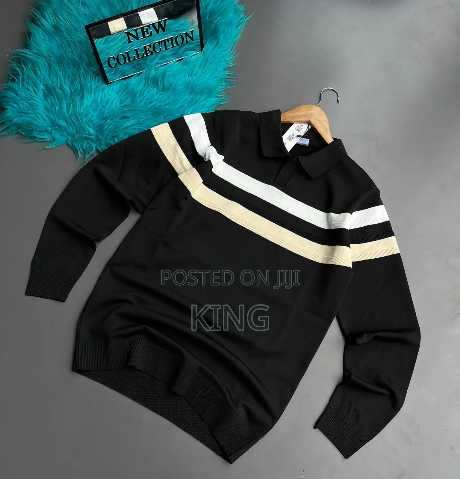 V Striped Pullover Sweater With a Polo Collar.