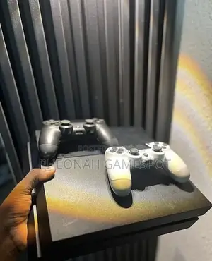 Ps4 Standard With 2 Controllers and 10games of Your Choice Inside
