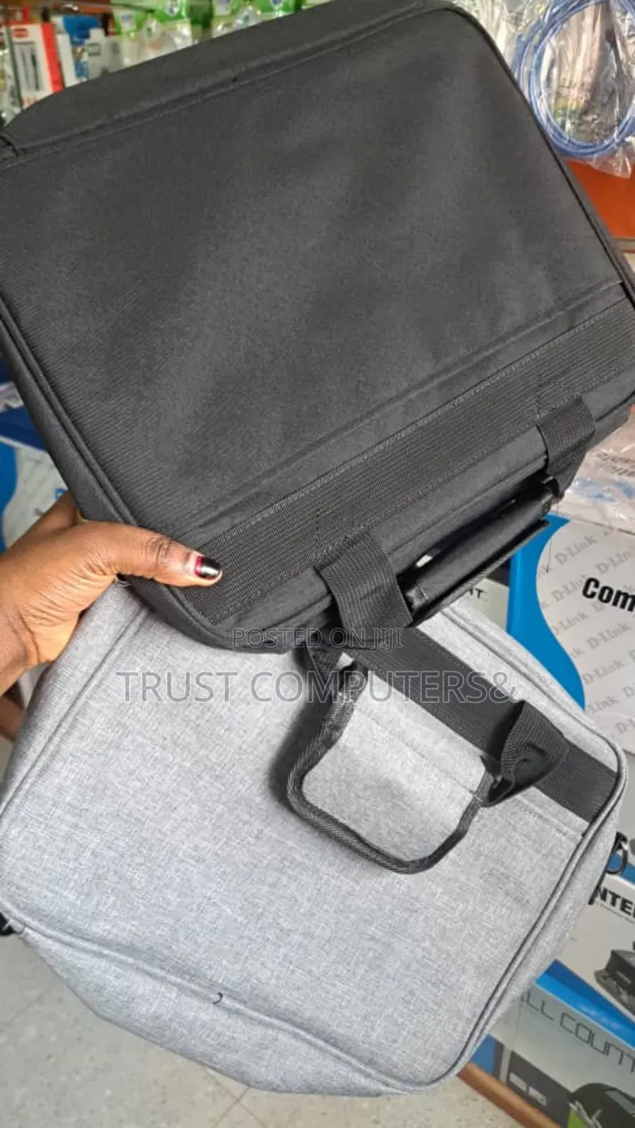 Black Carrying Case, Similar to Those Used for Projectors or Laptops.