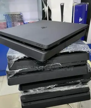 Sony Playstation 4 Slim With Everything You Need to Skip Work 15 Games