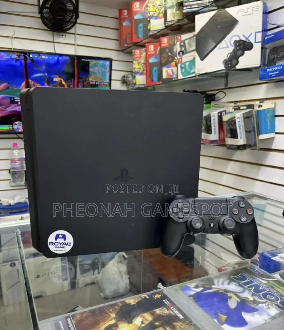 Clean Ps4 Slim With 2 Controllers and 10 Games Inside Fc26 Included