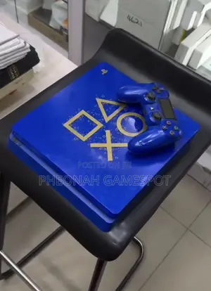 Ps4 Slim Good Quality With 2 Controllers and 15 Games Inside