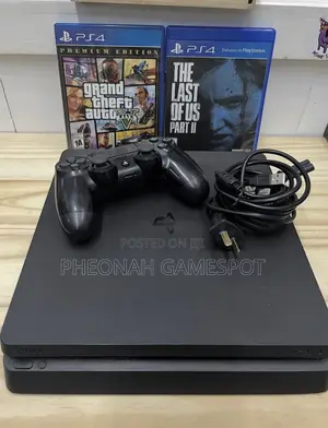 Ps4 Slim Good Quality With 2 Controllers and 15 Games Inside