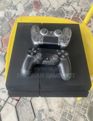 Ps4 Standard Very Good Condition With 2 Controllers and 10 Games
