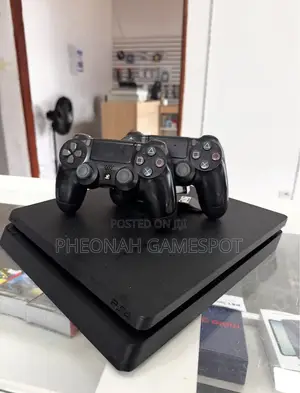 ​Ps4 Slim Console, 14 Games, 2 Dualshock 4 Controllers, All Wires