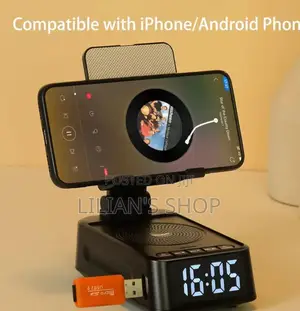 Phone Stand With Wireless Speaker and Alarm Clock.