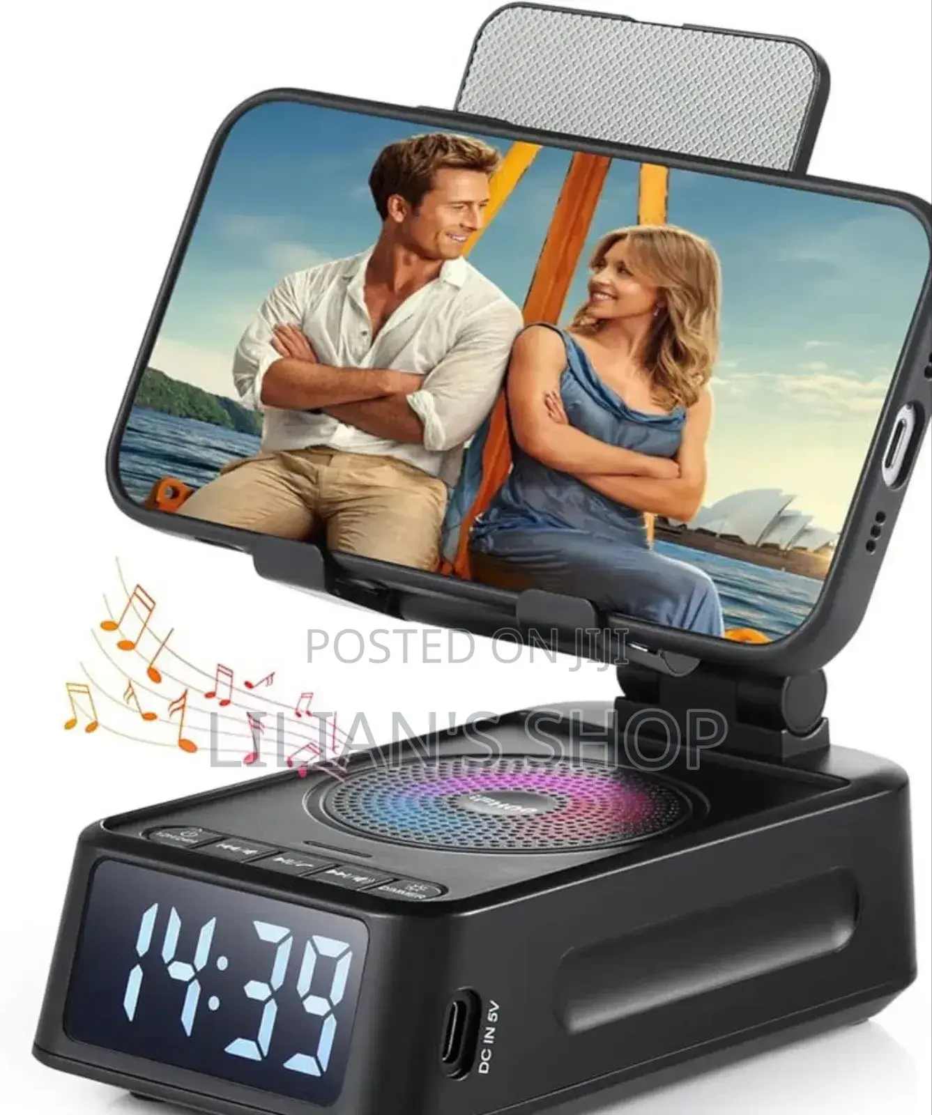 Phone Stand With Wireless Speaker and Alarm Clock.