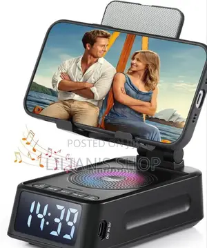 Phone Stand With Wireless Speaker and Alarm Clock.