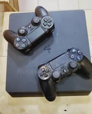 Quick Deal Playstation 4! Slim With 2 Pads and 12 Games Included