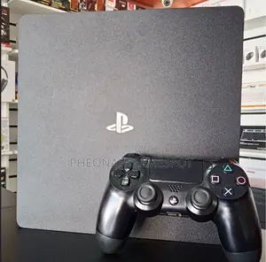 Ps4 Slim for Sale — Full Setup 2 Controllers and 15 Games Bonus.