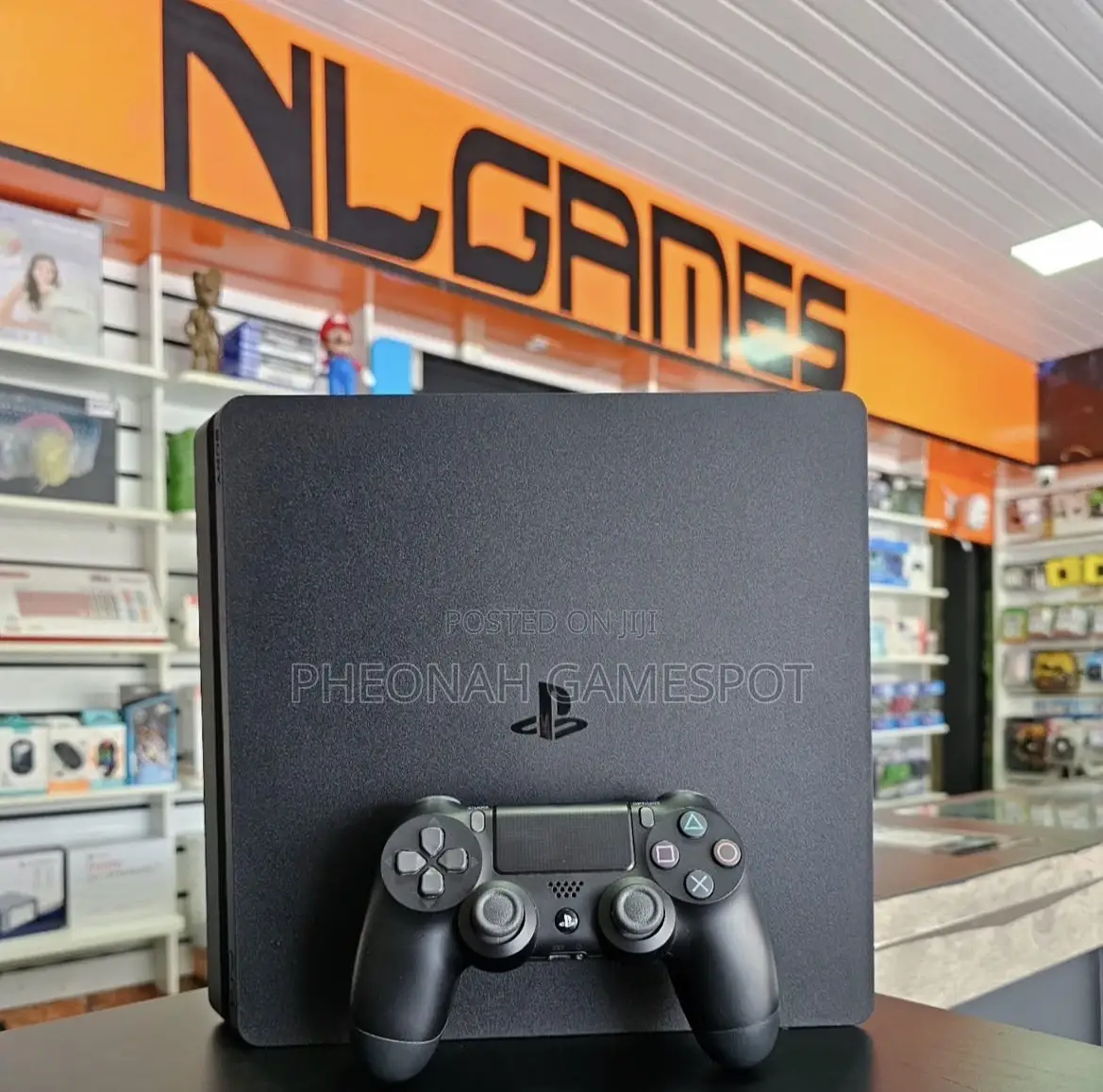 Playstation 4 Slim With Accessories and 22 Free Games of Your Choice