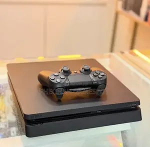 Playstation Slim 4 With 2 Pads and Great Games Selection.