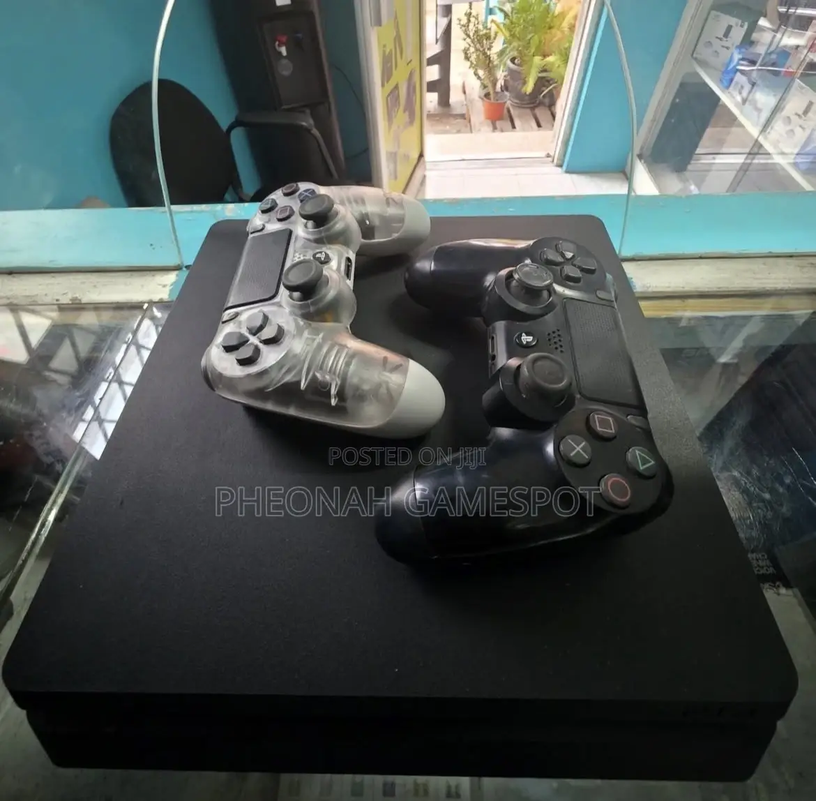 Ps4 Slim Console Ready to Play — 2 Pads , Includes 15 Games.
