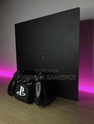 Complete Ps4 Slim With Dual Pads and 21 Loaded Games.