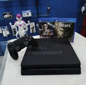 Playstation 4 Slim , Like New, With 23 Top Games Inside and 2 Pads