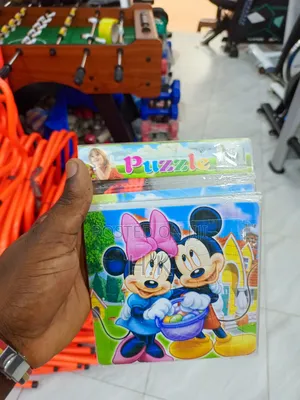 Jigsaw Puzzle Featuring the Disney Characters Mickey and Minnie Mouse.