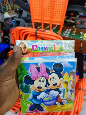 Jigsaw Puzzle Featuring the Disney Characters Mickey and Minnie Mouse.