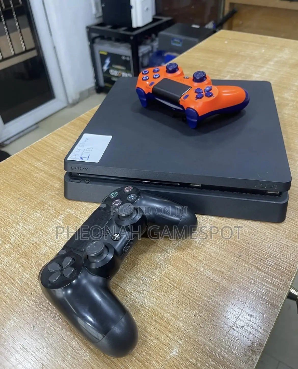Playstation 4 Slim Package — Full Accessories + 17 Games.