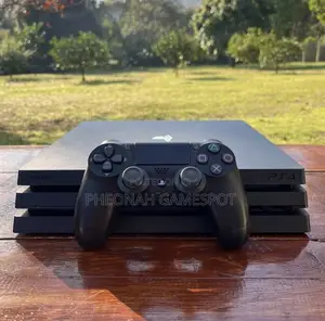 Complete Ps4 Pro Combo — 2 Pads and 26 Free Games.