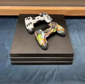 Playstation 4 Pro — 2 Controllers, 20 Exciting Games Installed!