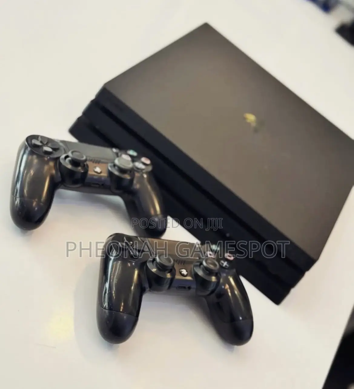 Playstation 4 Pro — 2 Pads, 27 Exciting Titles Included!