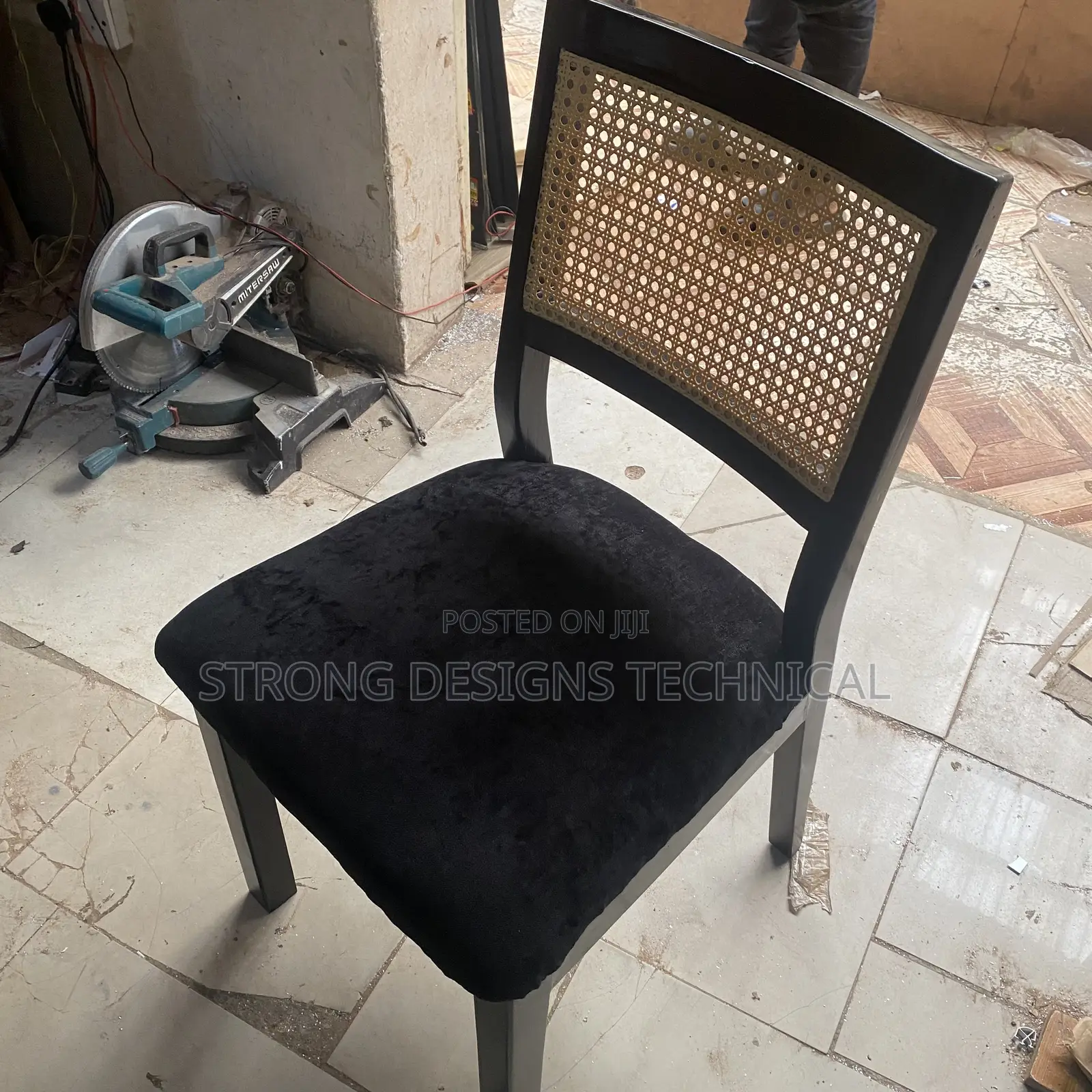 A Pair of 2 Rattan Dining Chairs.