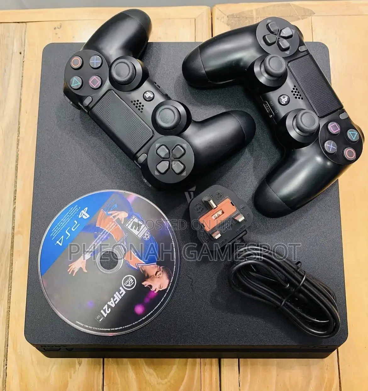 Playstation 4 Slim — 2 Controllers and 18 Exciting Titles Inside!