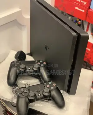 Playstation 4 Slim — 2 Controllers, 11 Fun Games Preloaded!