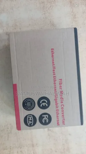 Pair of HTB-3100 Optical Fiber Media Converters.