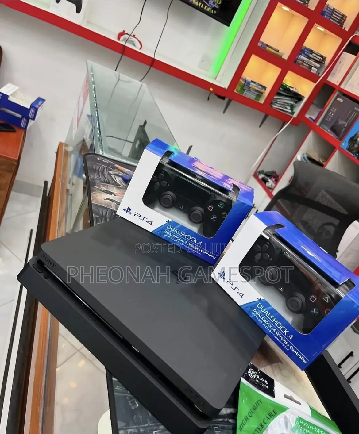 Playstation 4 Deal — 2 Controllers + 18 Hot Games Installed!