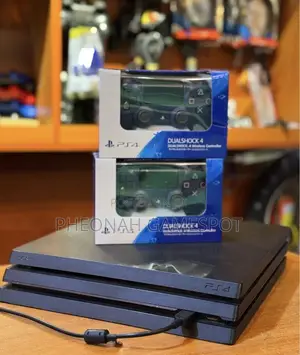 Playstation 4 Pro — 2 Pads, 14 Great Games, Ready Today!