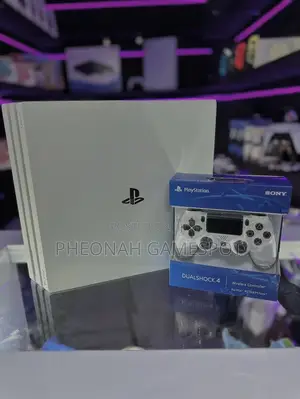 Playstation 4 Pro — 2 Pads, 21 Games, Perfect for Gaming Fun!