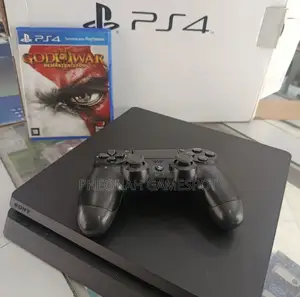 Playstation 4 Slim in Great Shape, Comes With 2 Pads and 15 Top Games!