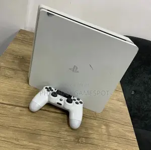 Enjoy Next-Level Gaming With Ps4 Slim , 2 Pads, and 15 Thrilling Games