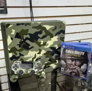 Grab This Ps4 Slim Combo With 2 Pads and 20 Exciting Games Installed!