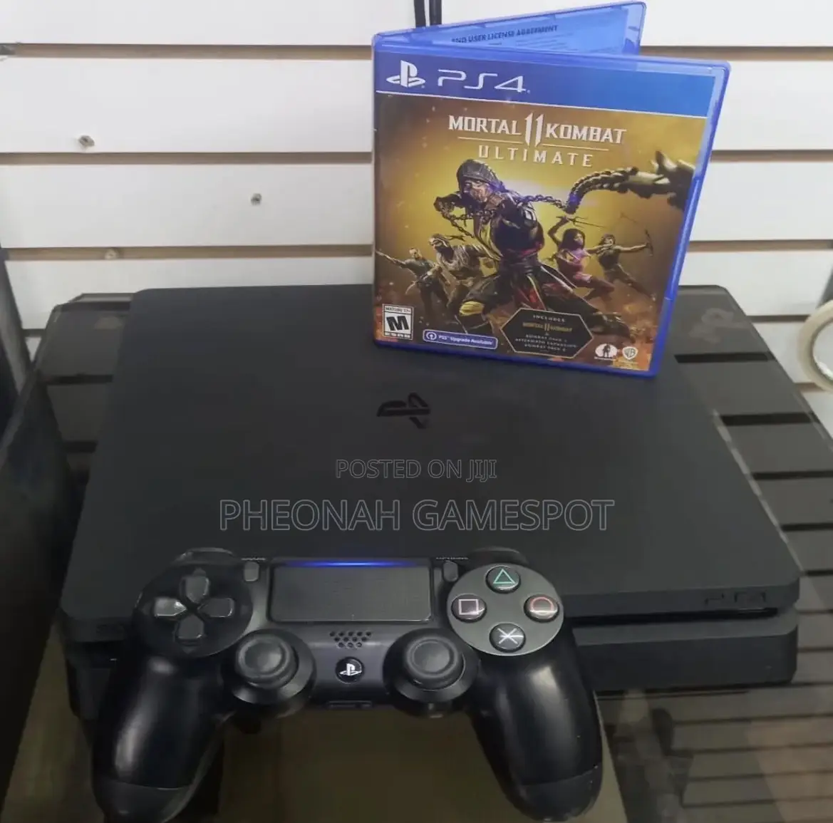Top-Quality Ps4 Slim With 2 Controllers, Clean System, Games Included!