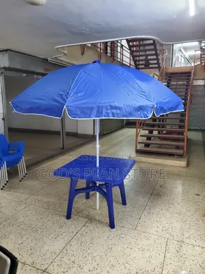 Chill Compound Umbrella and Table Set