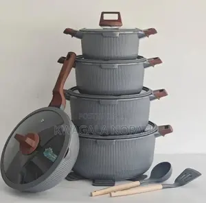 A 5 Piece Non Stick Donnor Cookware Set With Wooden Handles