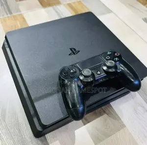 Playstation 4 Slim , Clean and Tested, 2 Controllers, 20 Top Games!