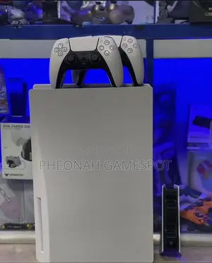 Clean Ps5 Standard Bundle With 2 Pads and 5 Fun Games!