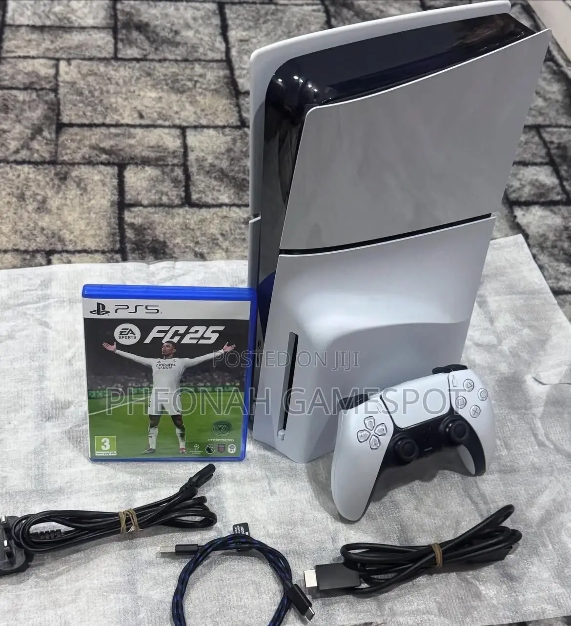 Compact Ps5 Slim, Great Condition, 2 Pads and Top Games Inside.