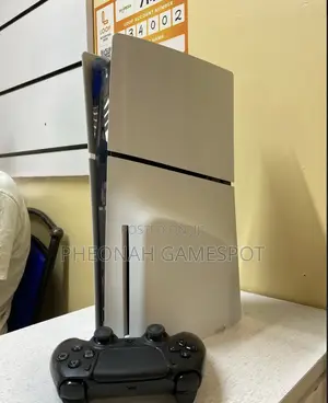 Like-New Ps5 Slim, Two Pads Included, 3 Installed Games.