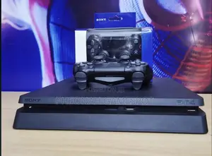 Good Ps4 Slim, Like New, 2 Pads, 20 Top Titles Preloaded.