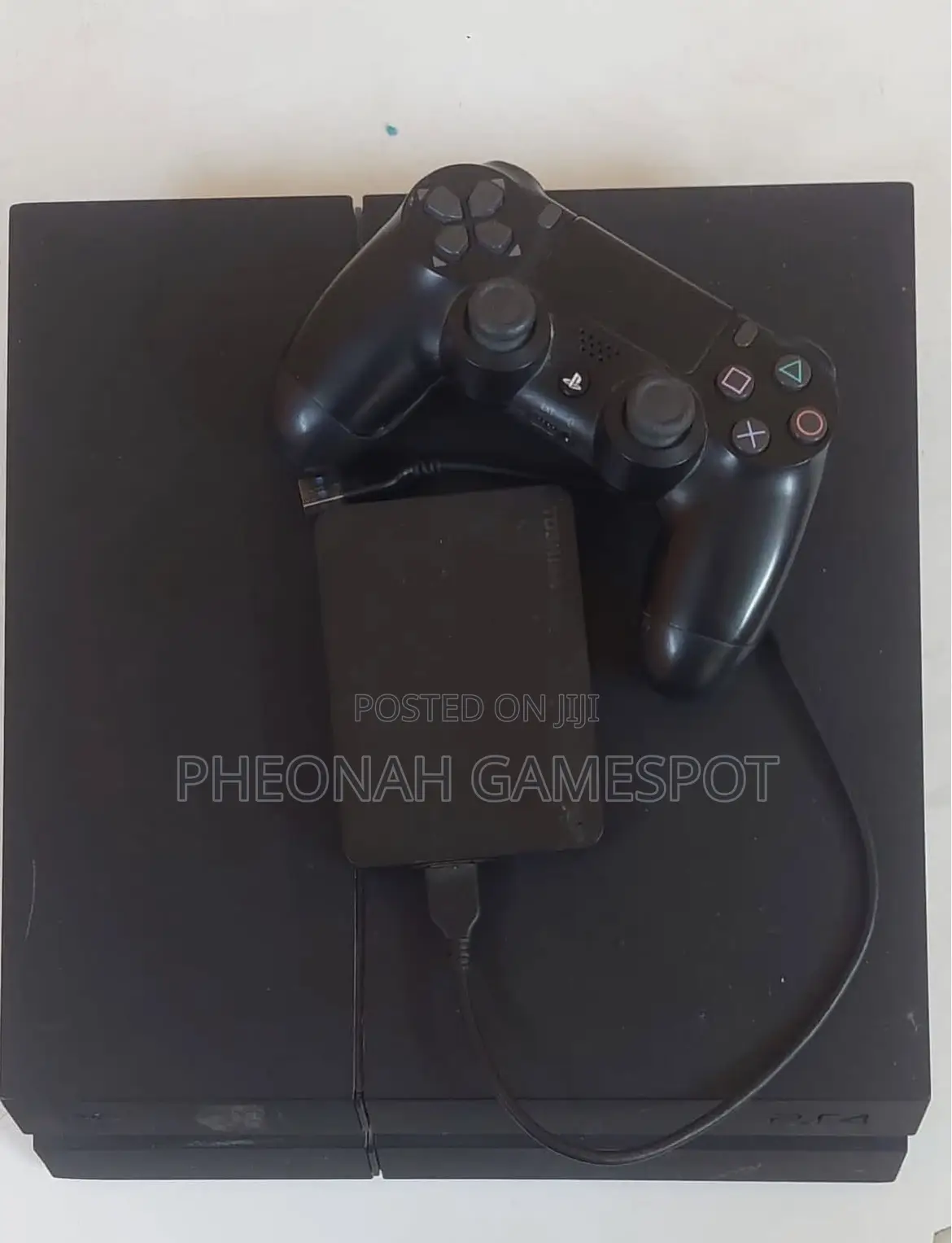 Playstation 4 Slim, Like New, 2 Pads, 18 Games Ready.