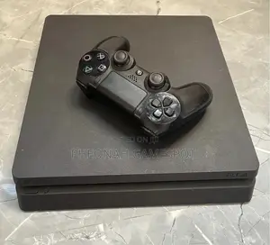Playstation 4 Slim, 2 Pads, 15 Loaded Titles Installed.