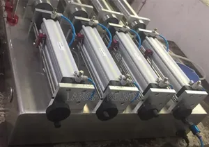 4 Heads Pneumetric Liquid Filling Machine